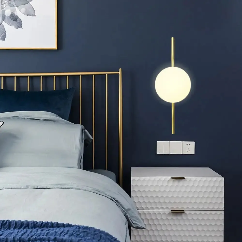 Globe White Glass Wall Mount Sconce Light with Elegant Gold Arm and Base